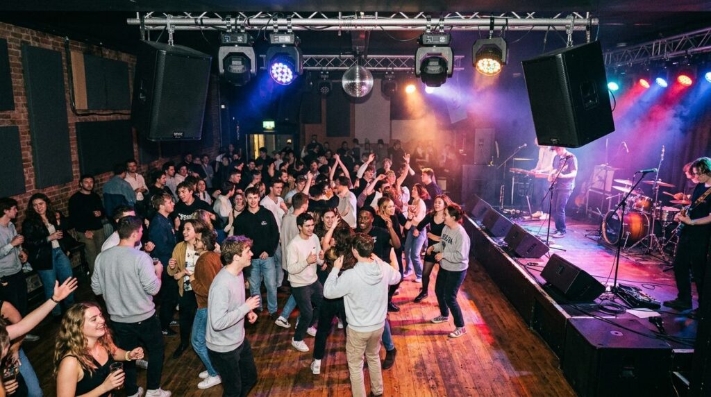Indoor student party venue with suspended professional PA sp